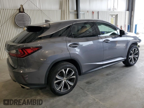 2016 Lexus RX 350 with VIN 2T2BZMCA1GC038794, listed as a Copart auction lot 64048765 with 114,205 mi miles and Salvage title. Bid and sale history available at DreamBid. Image 3.
