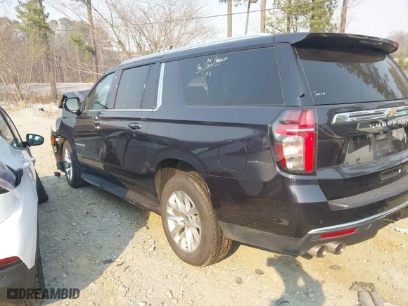 2023 Chevrolet Suburban Premier with VIN 1GNSKFKD4PR334079, listed as a IAAI auction lot 41657744 with 61,409 mi miles. Bid and sale history available at carsss.com. Image 3.