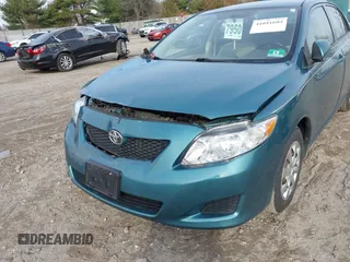 2009 Toyota Corolla with VIN JTDBL40E29J017358, listed as a IAAI auction lot 41041604 with 233,205 mi miles. Bid and sale history available at carsss.com. Image 18.