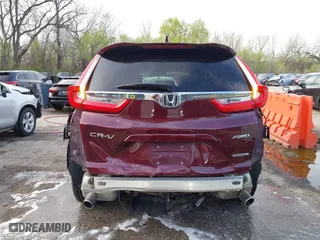 2017 Honda CR-V Touring with VIN 5J6RW2H95HL074264, listed as a IAAI auction lot 41974804 with 94,923 mi miles. Bid and sale history available at carsss.com. Image 17.