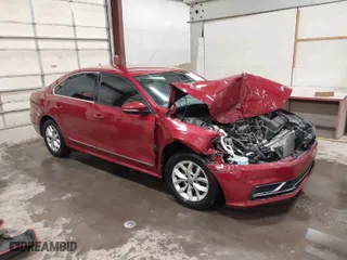 2016 Volkswagen Passat 1.8T S with VIN 1VWAS7A39GC013979, listed as a IAAI auction lot 41533003 with 162,746 mi miles. Bid and sale history available at carsss.com. Image 1.