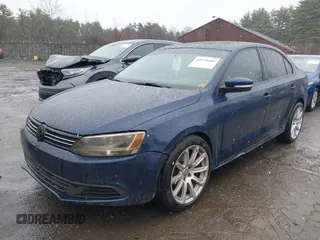 2011 Volkswagen Jetta Sedan SE w/Convenience & Sunroof PZEV with VIN 3VWDZ7AJ6BM326180, listed as a IAAI auction lot 41978482 with 137,189 mi miles. Bid and sale history available at carsss.com. Image 2.