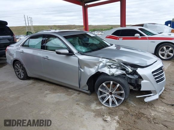 2016 Cadillac CTS Luxury Collection RWD z VIN 1G6AR5SXXG0128843, wystawiony jako IAAI lot #41404946 z przebiegiem 80 234 mil mil oraz . Historia ofert i sprzedaży dostępna na DreamBid. Obrazek 14.