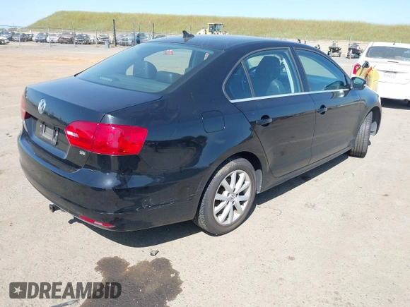 2014 Volkswagen Jetta Sedan SE w/Connectivity/Sunroof PZEV with VIN 3VWD17AJ8EM434456, listed as a IAAI auction lot 42099297 with 92,773 mi miles. Bid and sale history available at carsss.com. Image 4.
