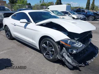 2021 Ford Mustang EcoBoost with VIN 1FA6P8TH4M5148415, listed as a IAAI auction lot 41945395 with 51,599 mi miles and . Bid and sale history available at DreamBid. Image 1.