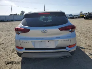 2017 Hyundai Tucson Sport z VIN KM8J33A26HU469865, wystawiony jako Copart lot #52766315 z przebiegiem 82 893 mil mil oraz Szkoda całkowita • Salvage title. Historia ofert i sprzedaży dostępna na DreamBid. Obrazek 6.