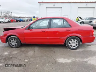 2000 Mazda Protege DX with VIN JM1BJ2224Y0277889, listed as a IAAI auction lot 41160593 with 124,586 mi miles and . Bid and sale history available at DreamBid. Image 14.