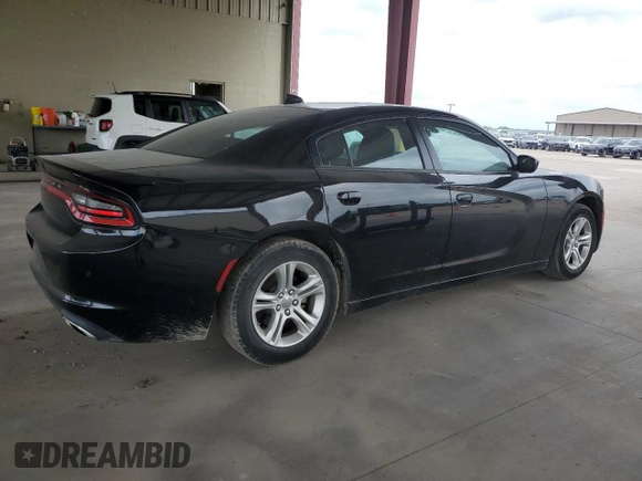 2023 Dodge Charger SXT with VIN 2C3CDXBG6PH533386, listed as a Copart auction lot 54747195 with 50,475 mi miles and Clean Title. Bid and sale history available at carsss.com. Image 3.