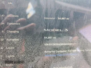 2023 Tesla Model 3 with VIN 5YJ3E1EA3PF602067, listed as a Copart auction lot 52317695 with 54,867 mi miles and Salvage Title. Bid and sale history available at DreamBid. Image 9.