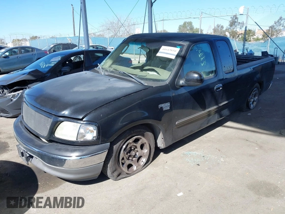 2002 Ford F-150 XL with VIN 1FTRX17WX2NB99454, listed as a IAAI auction lot 41643850 with 180,149 mi miles. Bid and sale history available at carsss.com. Image 17.