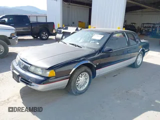 1994 Mercury Cougar z VIN 1MELM62W6RH604333, wystawiony jako IAAI lot #42406748 z przebiegiem 92 504 mil mil oraz . Historia ofert i sprzedaży dostępna na DreamBid. Obrazek 2.