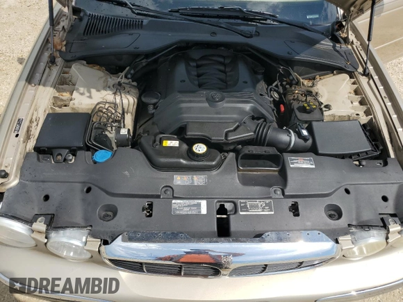 2004 Jaguar XJ with VIN SAJWA71C24SG28164, listed as a Copart auction lot 73968134 with 0 mi miles and Salvage Title. Bid and sale history available at carsss.com. Image 11.
