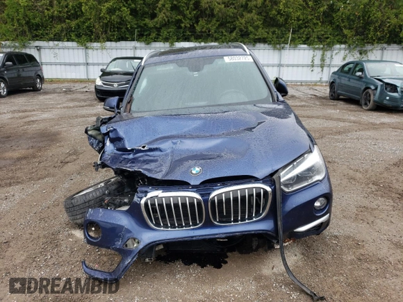 2018 BMW X1 xDrive28i with VIN WBXHT3C35J5F88893, listed as a Copart auction lot 58032725 with 143,968 mi miles and Salvage title. Bid and sale history available at DreamBid. Image 5.