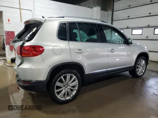 2013 Volkswagen Tiguan SE z VIN WVGBV3AX1DW579506, wystawiony jako Copart lot #52719575 z przebiegiem 163 471 mil mil oraz Szkoda całkowita • Salvage title. Historia ofert i sprzedaży dostępna na DreamBid. Obrazek 3.