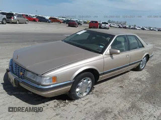 1997 Cadillac Seville Luxury SLS z VIN 1G6KS52Y7VU809288, wystawiony jako IAAI lot #29851802 z przebiegiem 93 879 mil mil oraz . Historia ofert i sprzedaży dostępna na DreamBid. Obrazek 2.