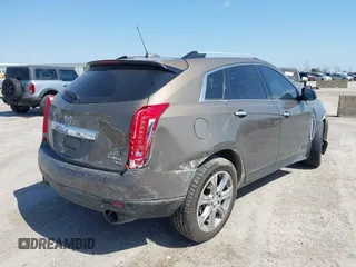 2015 Cadillac SRX Performance Collection with VIN 3GYFNCE31FS598109, listed as a IAAI auction lot 41788267 with 172,488 mi miles and . Bid and sale history available at DreamBid. Image 4.