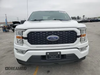 2021 Ford F-150 XL с VIN 1FTEW1CP4MKD82658, выставлен на аукционе Copart как лот 59974345 с пробегом 87 912 миль миль и Списание • Salvage title. История ставок и продаж доступна на DreamBid. Изображение 5.