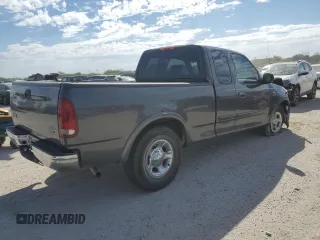 2003 Ford F-150 XL with VIN 1FTRX17L33NB34789, listed as a Copart auction lot 73762304 with 0 mi miles and Salvage Title. Bid and sale history available at carsss.com. Image 3.
