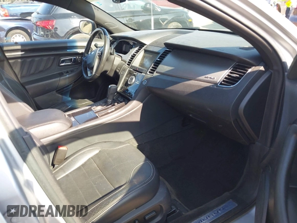 2014 Ford Taurus SHO with VIN 1FAHP2KT8EG123342, listed as a IAAI auction lot 42095390 with 142,957 mi miles. Bid and sale history available at carsss.com. Image 5.