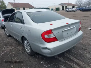 2003 Toyota Camry LE with VIN 4T1BE30K73U704489, listed as a IAAI auction lot 41905778 with Not Provided miles and . Bid and sale history available at DreamBid. Image 3.