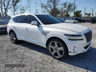 2021 Genesis GV80 with VIN KMUHCESC0MU054263, listed as a Copart auction lot 85953934 with 28,735 mi miles and Salvage Title. Bid and sale history available at DreamBid. Image 4.