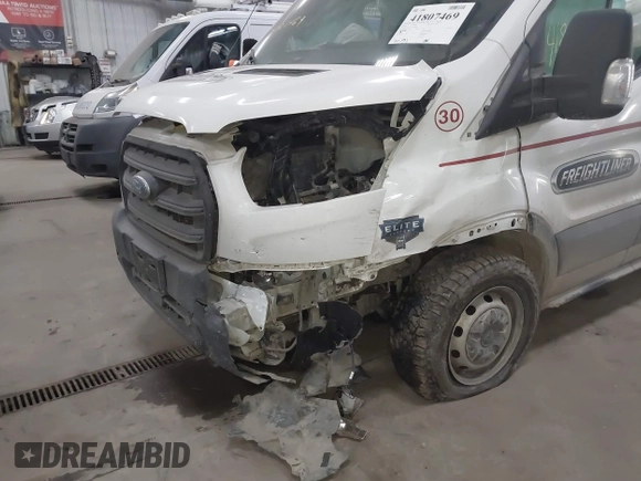 2020 Ford Transit Cargo z VIN 1FTBR1CG9LKB59461, wystawiony jako IAAI lot #41807469 z przebiegiem 205 431 mil mil oraz . Historia ofert i sprzedaży dostępna na DreamBid. Obrazek 6.