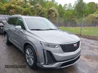 2024 Cadillac XT6 FWD Premium Luxury with VIN 1GYKPCRS0RZ748048, listed as a IAAI auction lot 42043117 with 7,232 mi miles. Bid and sale history available at carsss.com. Image 1.