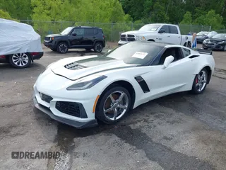 2014 Chevrolet Corvette 2LT z VIN 1G1YD2D7XE5116688, wystawiony jako IAAI lot #42063180 z przebiegiem Nie podano mil oraz . Historia ofert i sprzedaży dostępna na DreamBid. Obrazek 2.