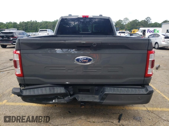 2021 Ford F-150 XL with VIN 1FTFW1ED0MFC98028, listed as a Copart auction lot 56652825 with 100,062 mi miles and Salvage title. Bid and sale history available at DreamBid. Image 6.