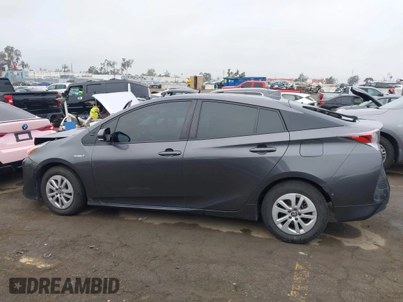 2018 Toyota Prius Two with VIN JTDKBRFUXJ3591956, listed as a IAAI auction lot 41848336 with 62,560 mi miles and . Bid and sale history available at DreamBid. Image 14.