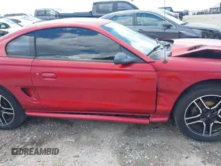 1994 Ford Mustang with VIN 1FALP4047RF117240, listed as a IAAI auction lot 42315542 with 120,825 mi miles and . Bid and sale history available at DreamBid. Image 13.