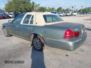 2005 Mercury Grand Marquis GS with VIN 2MEFM74WX5X627625, listed as a IAAI auction lot 41982651 with 87,044 mi miles and . Bid and sale history available at DreamBid. Image 3.