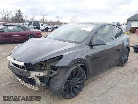 2023 Tesla Model Y Performance with VIN 7SAYGDEF2PF757113, listed as a IAAI auction lot 41881175 with 54,809 mi miles and . Bid and sale history available at DreamBid. Image 6.