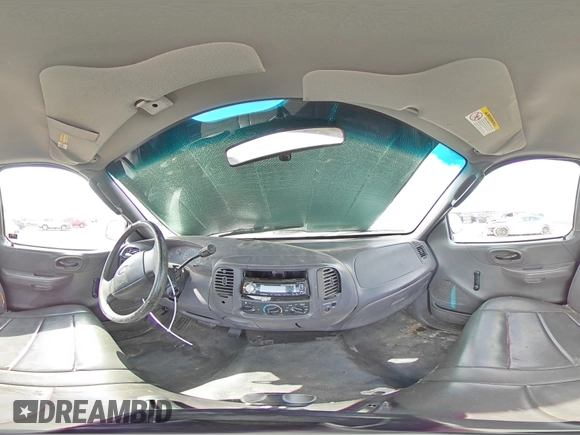 2004 Ford F-150 XL with VIN 2FTRF17294CA59985, listed as a Copart auction lot 55296195 with 220,933 mi miles and Salvage title. Bid and sale history available at DreamBid. Image 14.