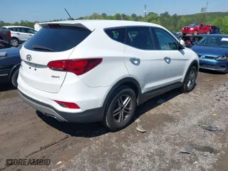 2018 Hyundai Santa Fe Sport 2.4L with VIN 5NMZT3LB7JH091203, listed as a IAAI auction lot 41983942 with 124,285 mi miles. Bid and sale history available at carsss.com. Image 4.