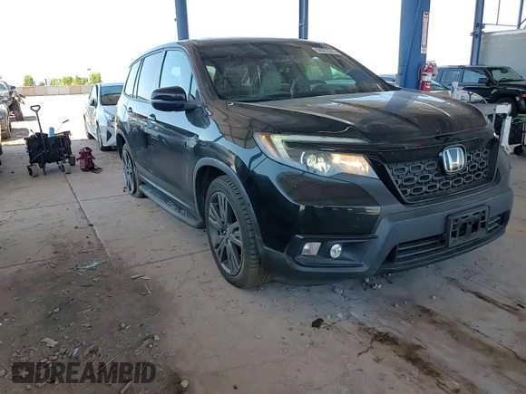 2019 Honda Passport EX-L с VIN 5FNYF7H53KB011007, выставлен на аукционе Copart как лот 58022835 с пробегом 49 018 миль миль и Списание • Salvage title. История ставок и продаж доступна на DreamBid. Изображение 14.