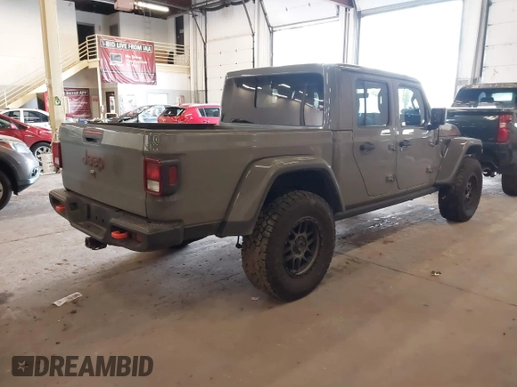 2021 Jeep Gladiator Mojave with VIN 1C6JJTEG1ML596109, listed as a IAAI auction lot 41783913 with 71,112 mi miles and . Bid and sale history available at DreamBid. Image 4.