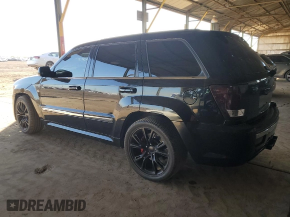 2008 Jeep Grand Cherokee SRT-8 with VIN 1J8HR78358C160930, listed as a Copart auction lot 80562324 with 137,147 mi miles and Salvage Title. Bid and sale history available at carsss.com. Image 2.
