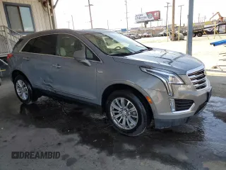 2019 Cadillac XT5 Luxury FWD z VIN 1GYKNCRS4KZ221304, wystawiony jako Copart lot #54995415 z przebiegiem 128 940 mil mil oraz Szkoda całkowita • Salvage title. Historia ofert i sprzedaży dostępna na DreamBid. Obrazek 4.