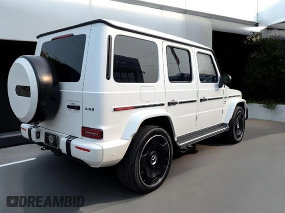2022 Mercedes-Benz G 63 AMG z VIN W1NYC7HJ1NX453XXX, wystawiony jako Copart lot #60002315 z przebiegiem 17 560 mil mil oraz Czysty tytuł • Clean title. Historia ofert i sprzedaży dostępna na DreamBid. Obrazek 4.