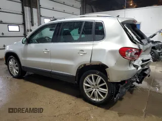 2013 Volkswagen Tiguan SE z VIN WVGBV3AX1DW579506, wystawiony jako Copart lot #52719575 z przebiegiem 163 471 mil mil oraz Szkoda całkowita • Salvage title. Historia ofert i sprzedaży dostępna na DreamBid. Obrazek 2.