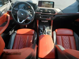 2019 BMW X4 M40i with VIN 5UXUJ5C58KLA93517, listed as a Copart auction lot 51622125 with 127,828 mi miles and Salvage title. Bid and sale history available at DreamBid. Image 8.