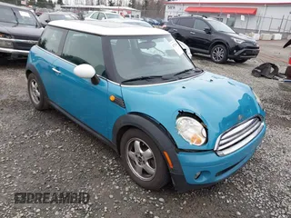 2009 MINI Cooper Hardtop with VIN WMWMF33569TW70413, listed as a IAAI auction lot 41776589 with 85,394 mi miles. Bid and sale history available at carsss.com. Image 1.