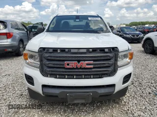 2015 GMC Canyon with VIN 1GTH51EA9F1263487, listed as a Copart auction lot 64905974 with 123,596 mi miles and Clean title. Bid and sale history available at DreamBid. Image 5.