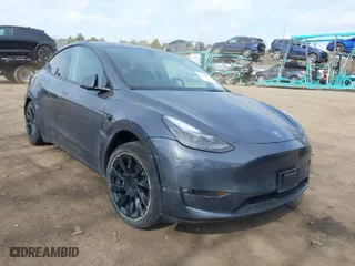 2023 Tesla Model Y Long Range with VIN 7SAYGDEE6PF637452, listed as a IAAI auction lot 41699940 with 18,964 mi miles. Bid and sale history available at carsss.com. Image 1.