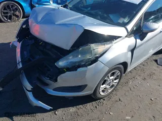 2016 Ford Fiesta SE with VIN 3FADP4EJ2GM150551, listed as a IAAI auction lot 41329285 with 136,305 mi miles. Bid and sale history available at carsss.com. Image 6.