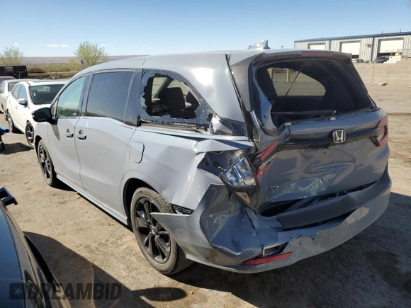 2023 Honda Odyssey Sport with VIN 5FNRL6H77PB052532, listed as a Copart auction lot 50596275 with 23,457 mi miles and Salvage Title. Bid and sale history available at carsss.com. Image 2.