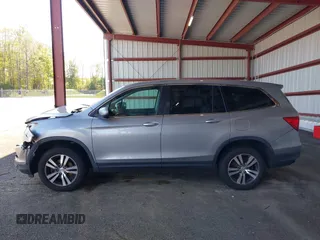 2017 Honda Pilot EX-L with VIN 5FNYF6H56HB063329, listed as a IAAI auction lot 42231498 with 179,695 mi miles and . Bid and sale history available at DreamBid. Image 14.