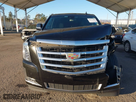 2020 Cadillac Escalade ESV Luxury z VIN 1GYS4HKJ3LR181834, wystawiony jako IAAI lot #40813416 z przebiegiem 65 857 mil mil oraz . Historia ofert i sprzedaży dostępna na DreamBid. Obrazek 13.