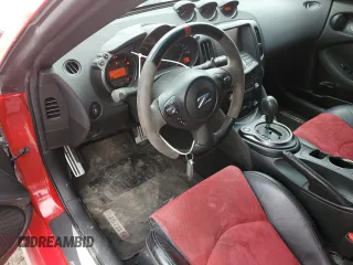 2015 Nissan 370Z z VIN JN1AZ4EH6FM442575, wystawiony jako Copart lot #57146915 z przebiegiem 57 020 mil mil oraz Czysty tytuł • Clean title. Historia ofert i sprzedaży dostępna na DreamBid. Obrazek 8.